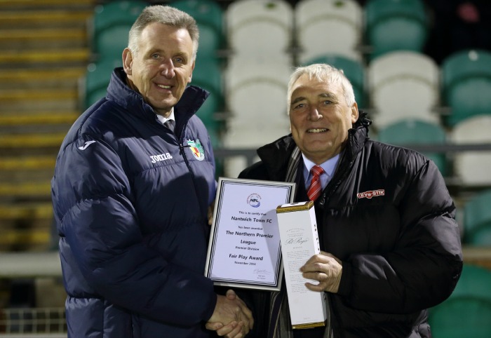Jon Gold (left) receives fair play award for Nantwich Town