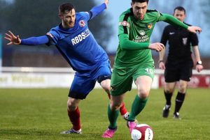 Jordan Cole on the ball v Shaw Lane