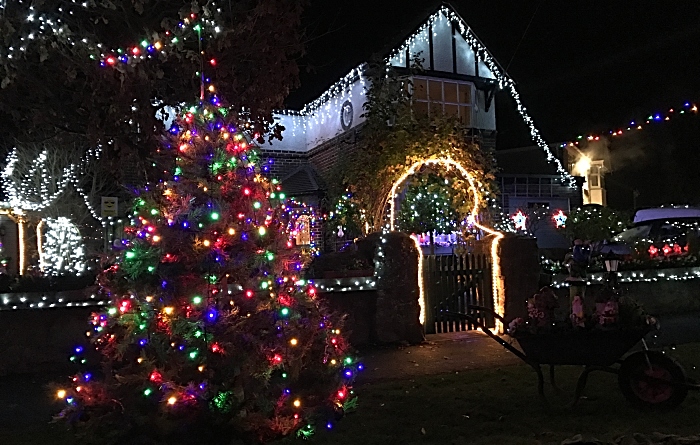 Laurence Perrys home lit up at nighttime (3)