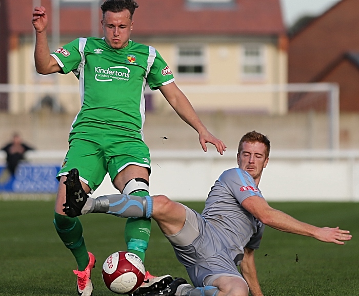 Louis Barnes is tackled for the ball (1)