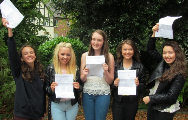 Malbank School students celebrating GCSEs