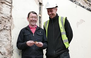 Stonemason reunited with matchbox left in Beeston Castle wall in 1964!