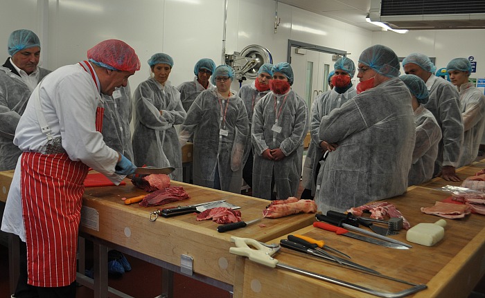 butchers - Master butcher Gary Evans demonstrates knife skills to employers and apprentices