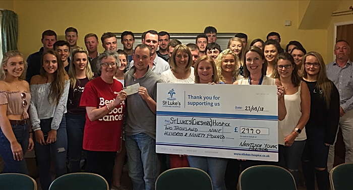 Panto - Nantwich Young Farmers Club present cheques to Liz Boffey from Bloodwise and Angela Slack from St Lukes Cheshire Hospice