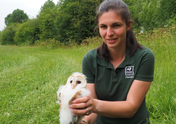 Natalie Webb holding barn owl