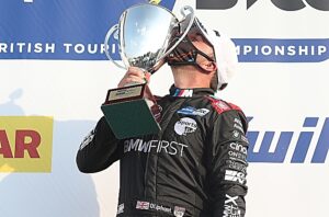 Tarporley racing driver Tom Oliphant earns maiden victory in BTCC
