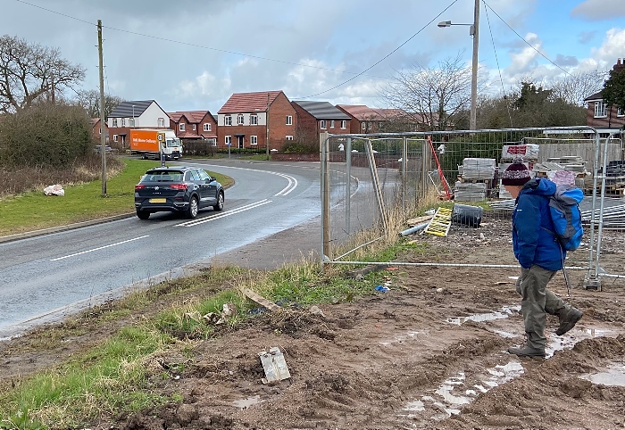 Pedestrian forced to re-join Wistaston Green Road due to inaccessible roadside footpath (1)