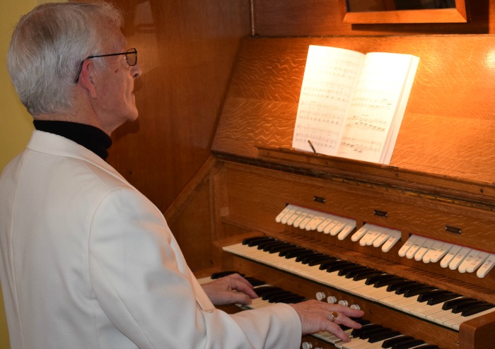 Phil Houghton plays the organ- Wistaston Singers