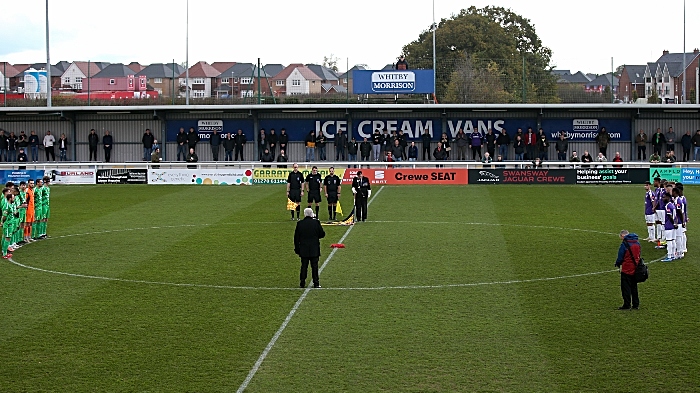Players and fans during a respectful one-minute silence (1)