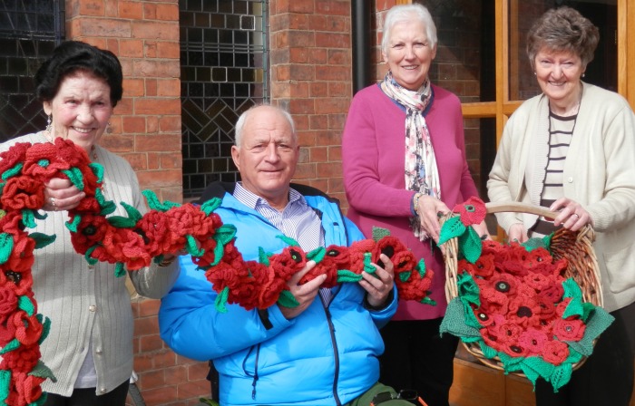 Knitted poppies made for Poppy Explosion Project