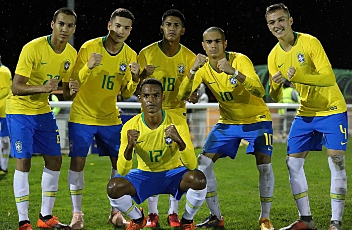 Post-match - Brazil players celebrate their win