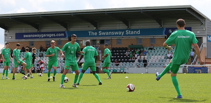 Pre-match - Dabbers players warmup in front of The Swansway Stand (1)