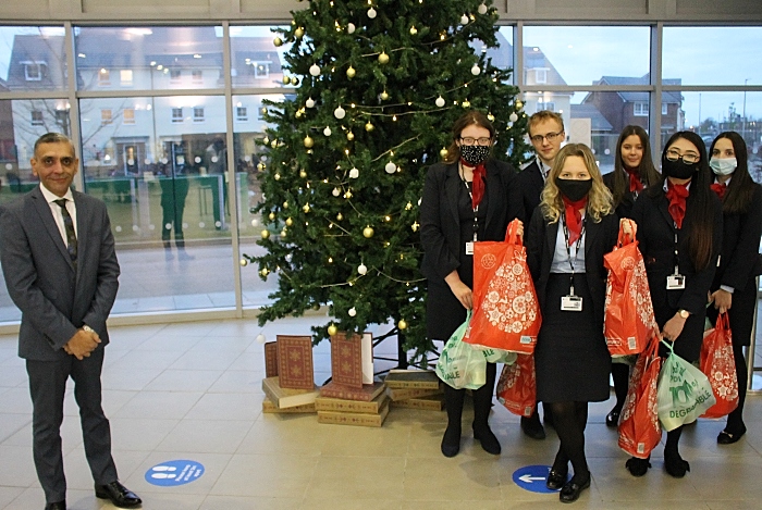 Principal and CEO of Cheshire College South & West Dhesi with Travel & Tourism learners collecting their hampers (1)