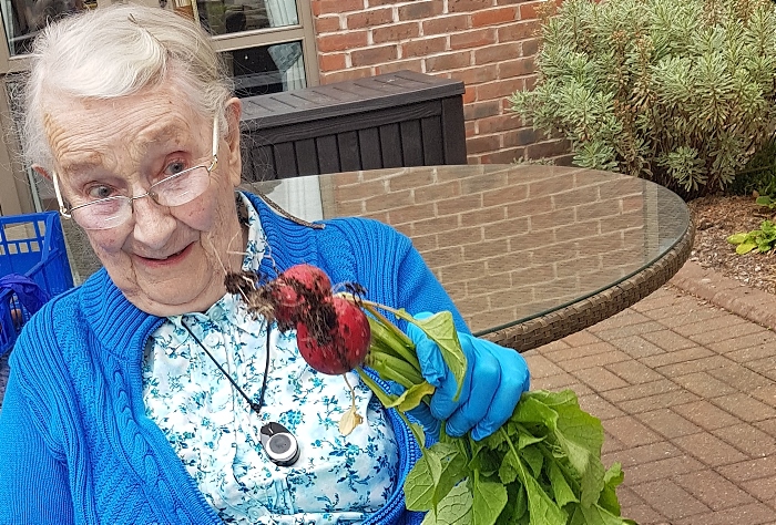 Rachael and her radish crop - richmond village