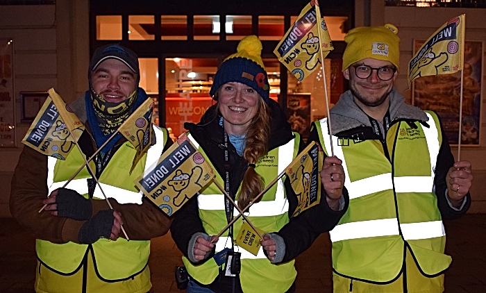 Rickshaw Challenge team prepare to handout welcome flags in Memorial Square (2)