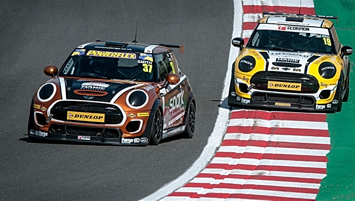 Rob Smith battles for position in MINI Challenge