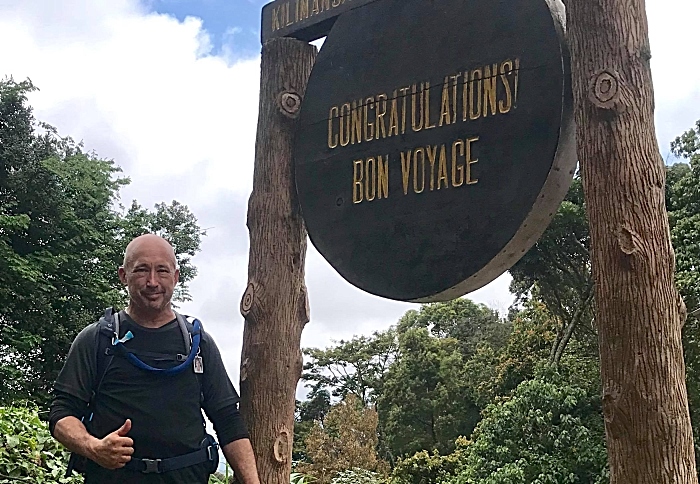 Roy Price begins his walk up Mount Kilimanjaro