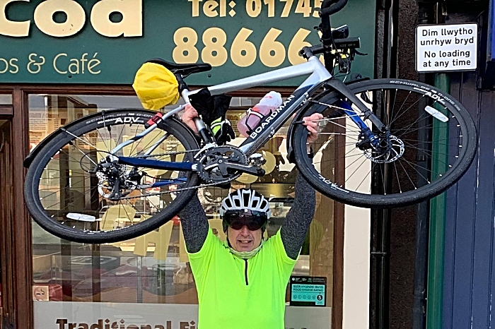 Roy Price celebrates finishing the route outside crispy Cod in Prestatyn (1)