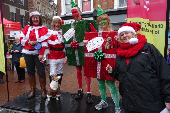 Santa Dash - Best dressed competition winners David Barley and Sally Tolhurst with judges and Liz Southall