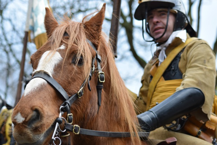 Sealed Knot cavalry rider adjacent to St Marys Church prior to battle