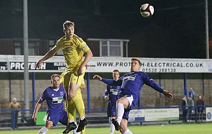 Second-half - Connor Heath rises to win the ball (1)