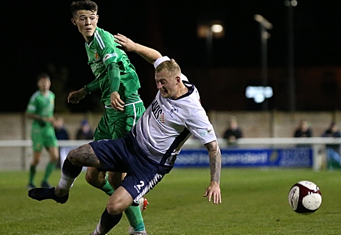 Second-half - Joe Malkin challenges for the ball (1)