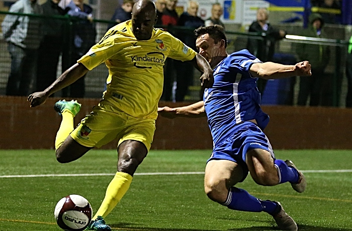 Second-half - Joe Mwasile crosses the ball under pressure (1)