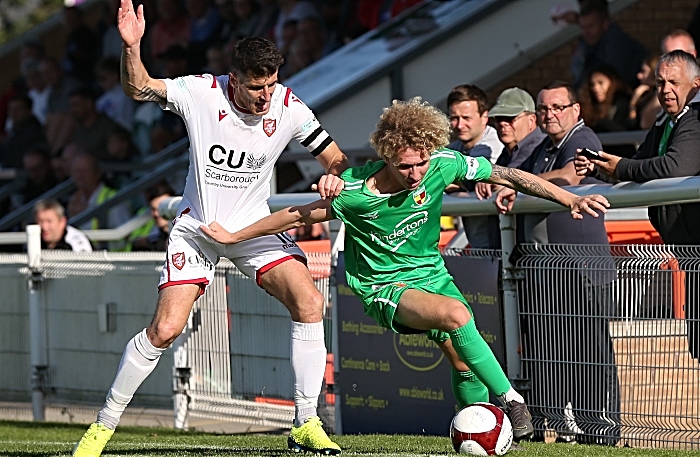 Second-half - Luke Walsh fights for the ball under pressure (1)