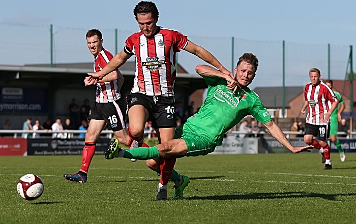 Second-half - Nantwich Town challenge for the ball (1)