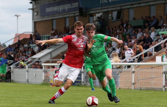 v Crewe Alex - Second-half - opposition players fight for the ball in front of The Swansway Stand (1)