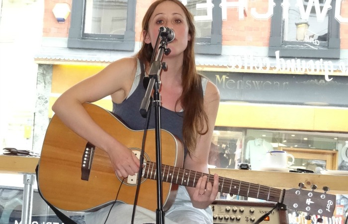 Singer Hannah White performs at Bloom