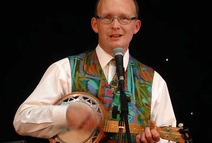 Society member Chris White performs at a South Cheshire George Formby Ukulele Society concert