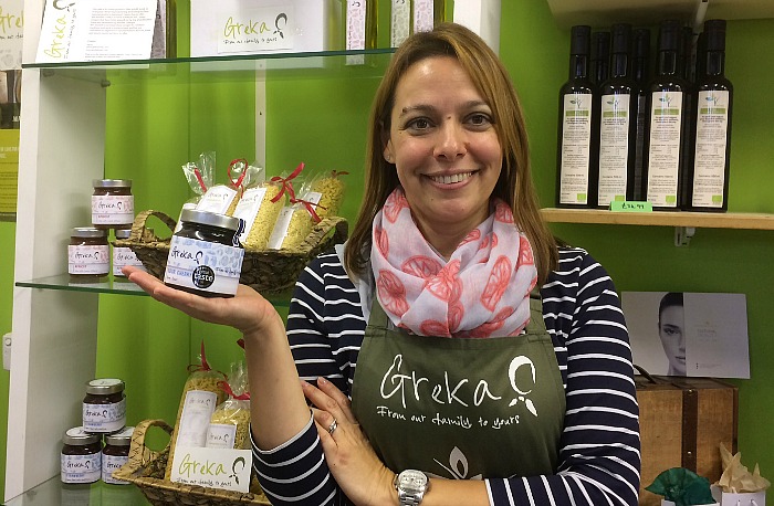 Greek woman Sofia of Greka Foods with award-winning product