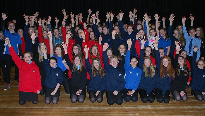 Some of the 120 students involved in the production practise for the curtain call