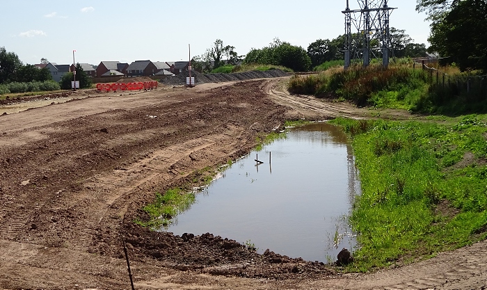 Spine road-bypass adjacent to River Weaver - section holding rainwater (1)