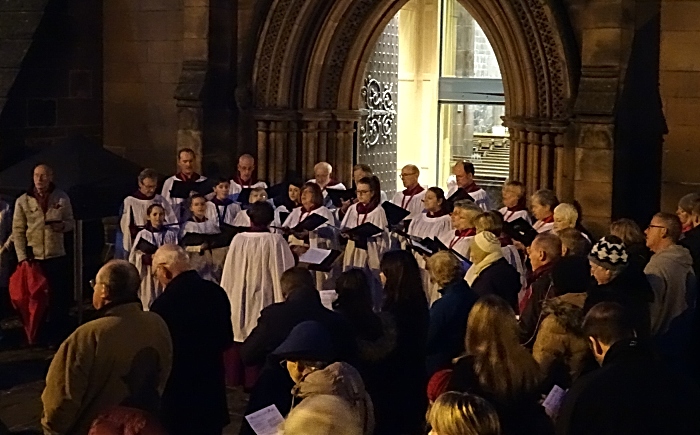 St Marys choir sings outside the west doors of St Marys Church (1)