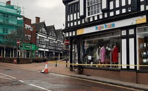 Nantwich town centre road closed after car crashes into shop