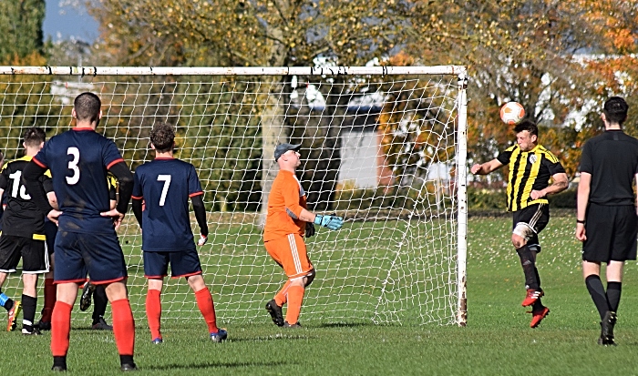 Talbot head the ball clear of goal (1)