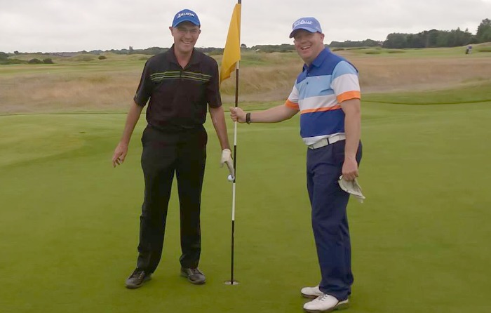 Tim Jackson, left, after hole-in-one at Royal Lytham