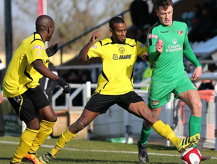 Toby Mullarkey eyes the ball under pressure from Halesowen