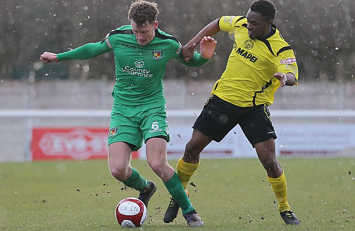 Toby Mullarkey on the ball in a snowstorm