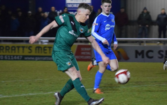 Tom Peers chips the goalkeeper for the second goal v Frickley