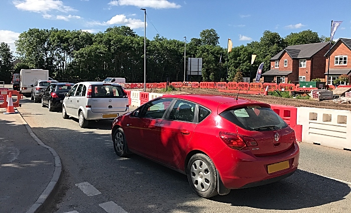 Vehicles wait to exit the A530 (Middlewich Road)-Wistaston Green Road junction (1)