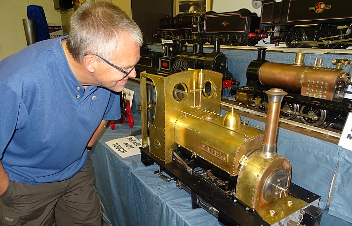 visitor-mark-ray-inspects-the-display-of-locomotives-and-engines