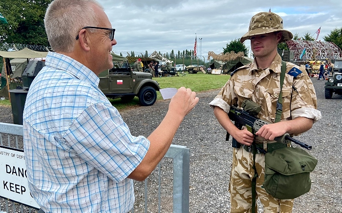 Visitor Mark Ray shows his entrance ticket to an RAF Regiment Officer (1)