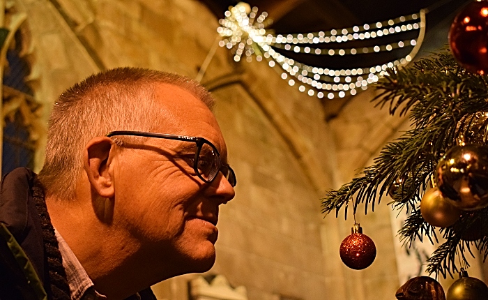 Visitor Mark Ray views a Christmas tree (1)