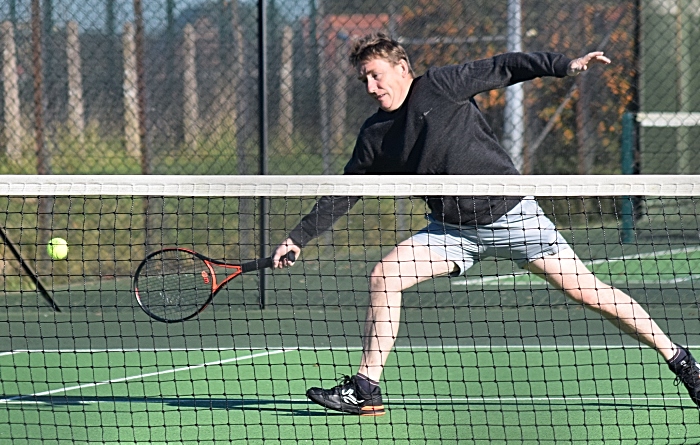 tennis - Wistaston A vs Holmes Chapel A - Chris Raiswell stretches for the ball (1)