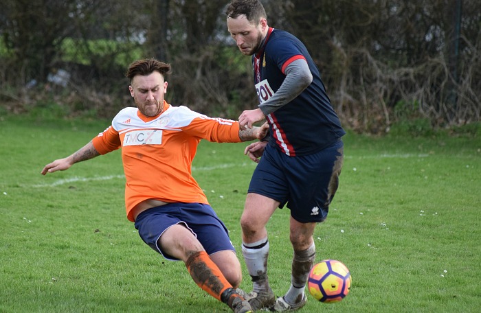 Wistaston Athletic player clears the ball