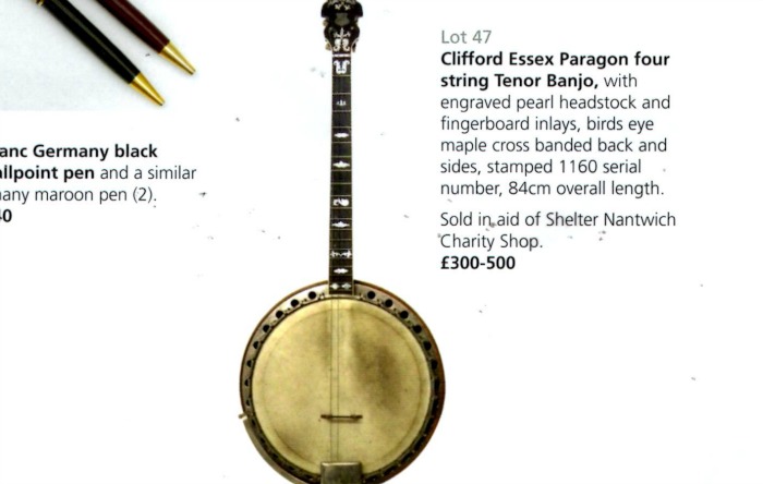 banjo auctioned for charity shop
