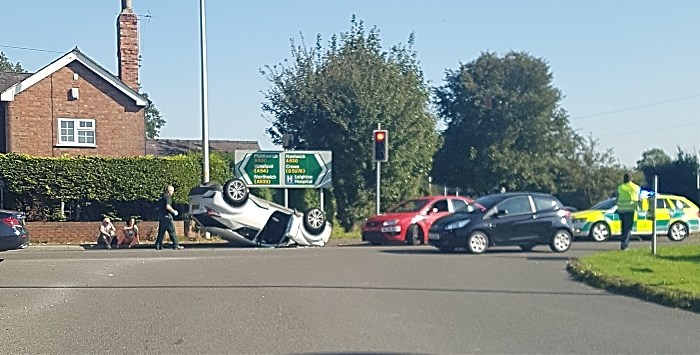 car flipped on roof in accident